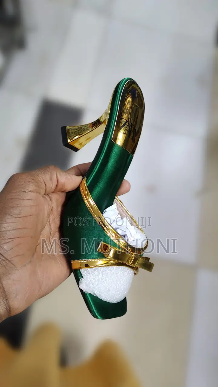 Gold Slip-on Heels Feature a Square-Toe Design 37-41