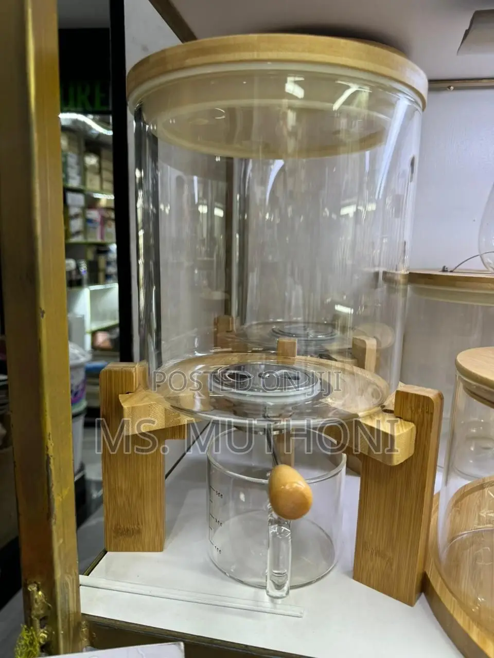 5l / 7.5 L Glass Rice Dispenser Featuring a Bamboo Stand.