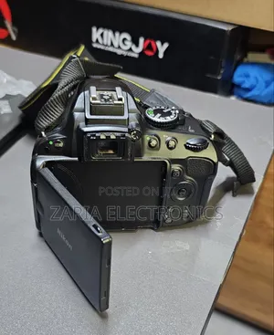 Nikon D5100 Camera With 18-55mm Lens,Battery,Charger and Strap