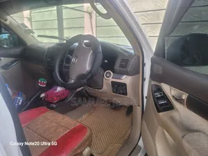 Prado J120
