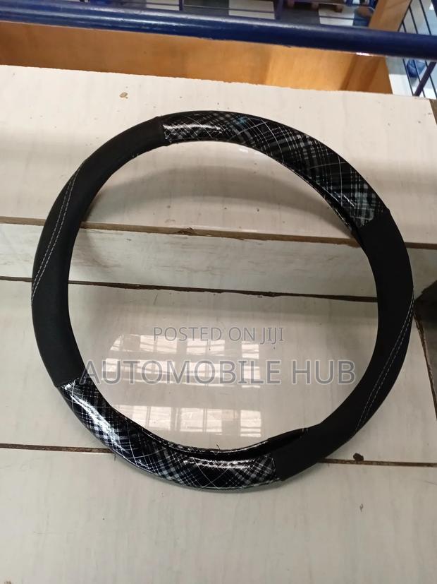 Carbon Fiber Leather Steering Wheel Cover–Sporty Design & Strong Grip