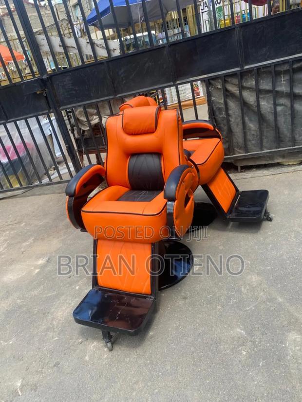 Rotating Orange Kinyozi Equipments - main view