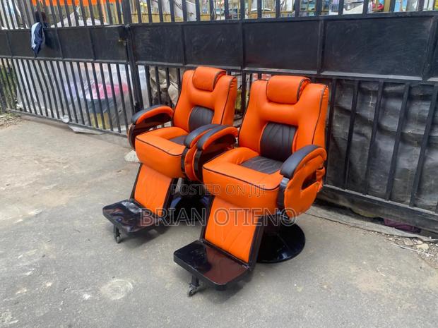 Black Base Kinyozi Orange Seats - main view