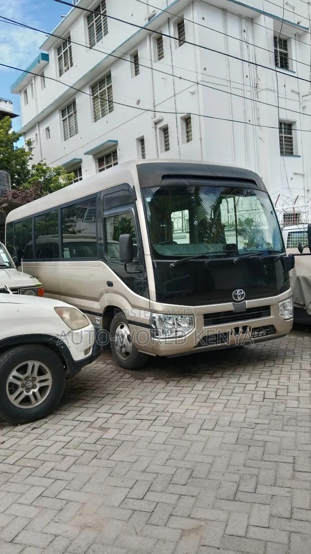 Toyota Coaster 2019 Gold - thumbnail 2