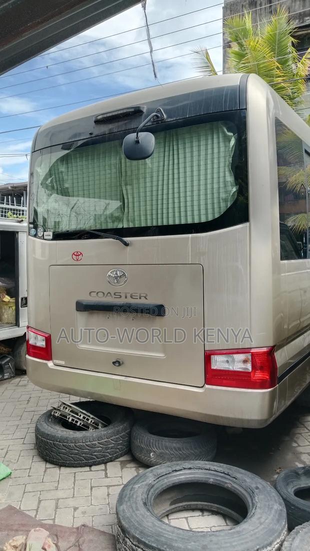 Toyota Coaster 2019 Gold - thumbnail 4