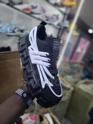 Black and White Rebel Versace Sneakers.