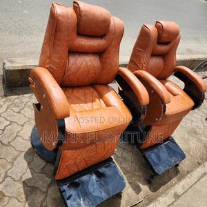 Brown Kinyozi Chairs