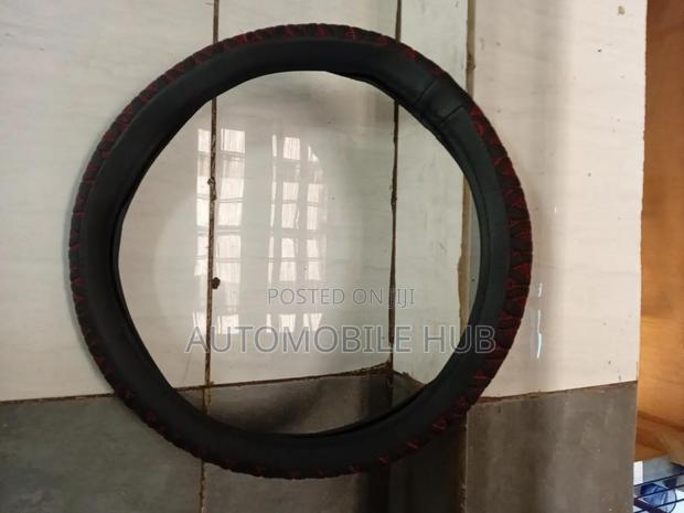 Embossed Leather Steering Wheel Cover – Luxury Design Anti-Slip Grip