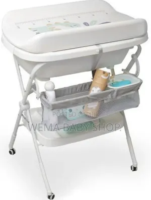 2 in 1 Foldable Baby Bath and Changing Station With Ergonomic Height.
