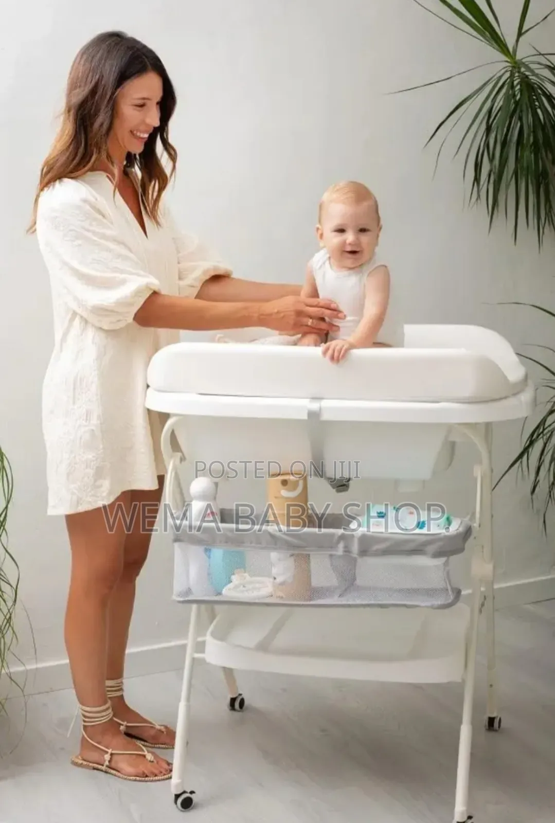 2 in 1 Foldable Baby Bath and Changing Station With Ergonomic Height.