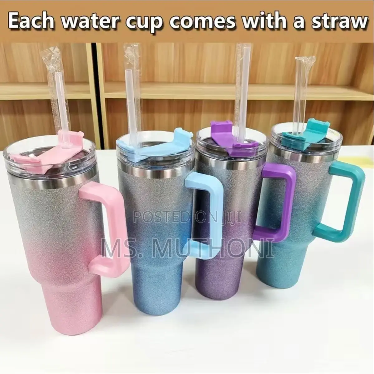 Stainless Steel Glitter Ombré Tumbler With a Handle and Lid.