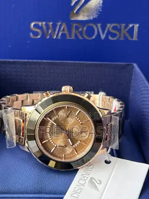 Swarovski Octea Lux Sport Rose Gold Brown and Pink Dial Women Watch