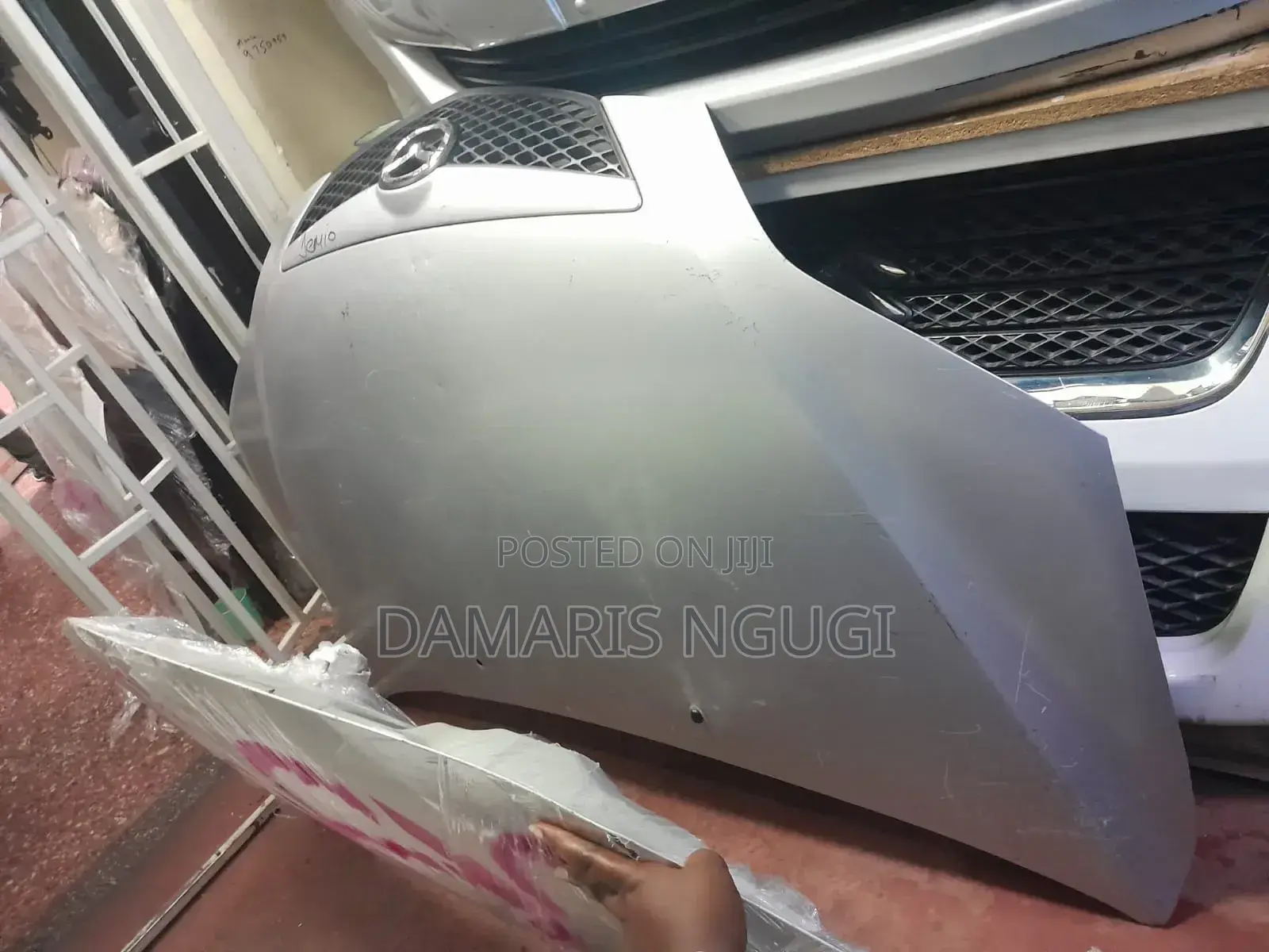 Mazda Demio Bonnet 2005