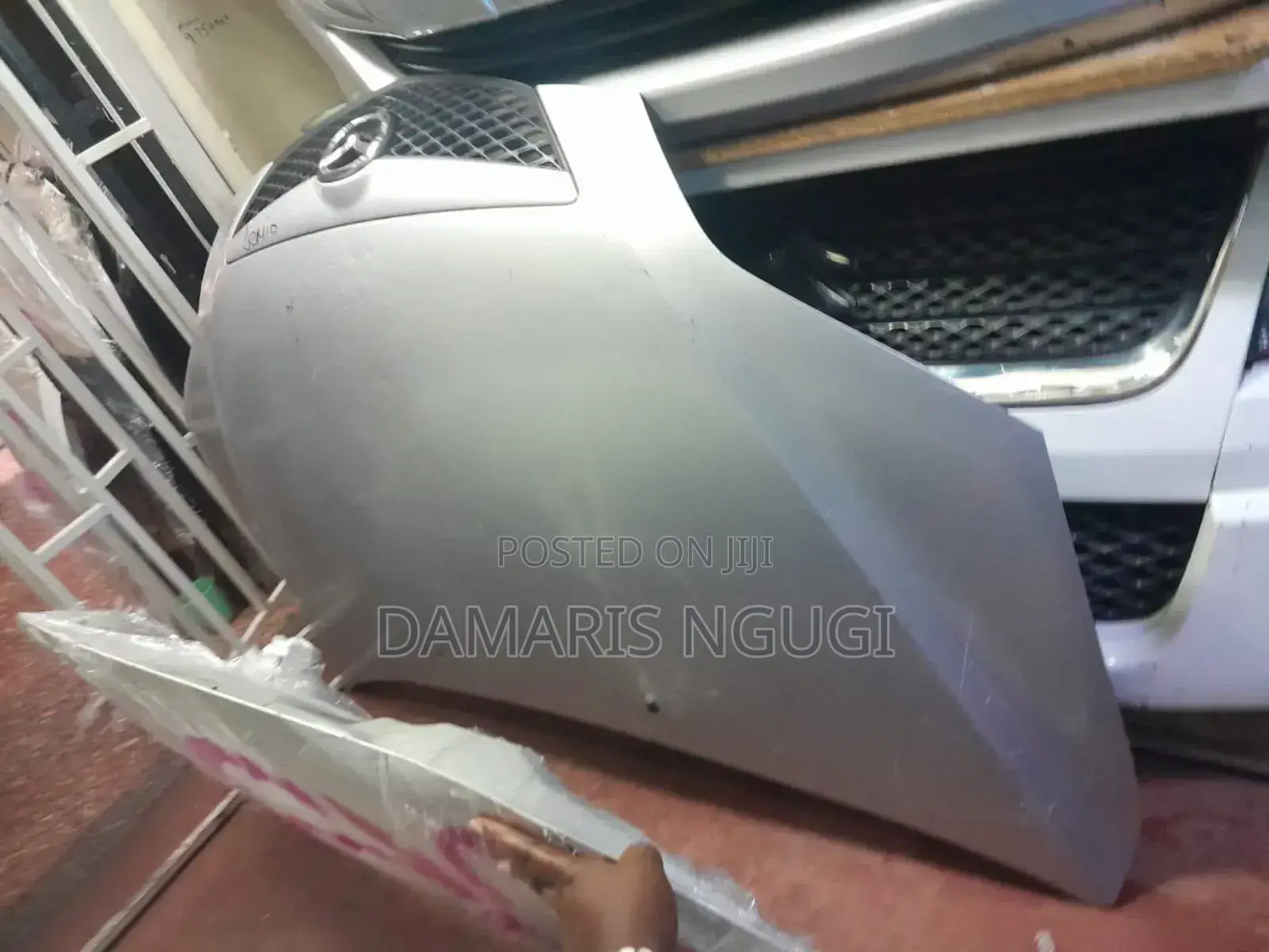 Mazda Demio Bonnet 2005