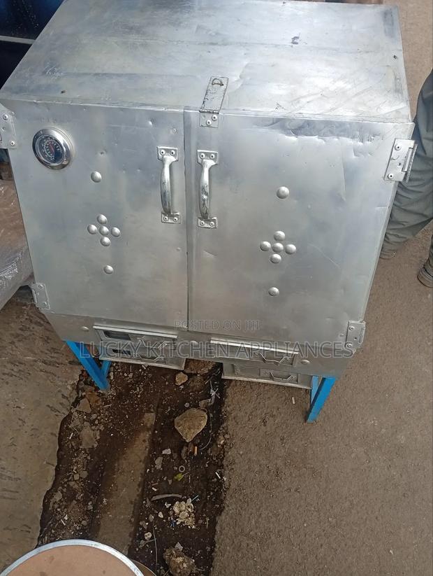 Two Jiko Aluminium Ovens With a Timer. - main view