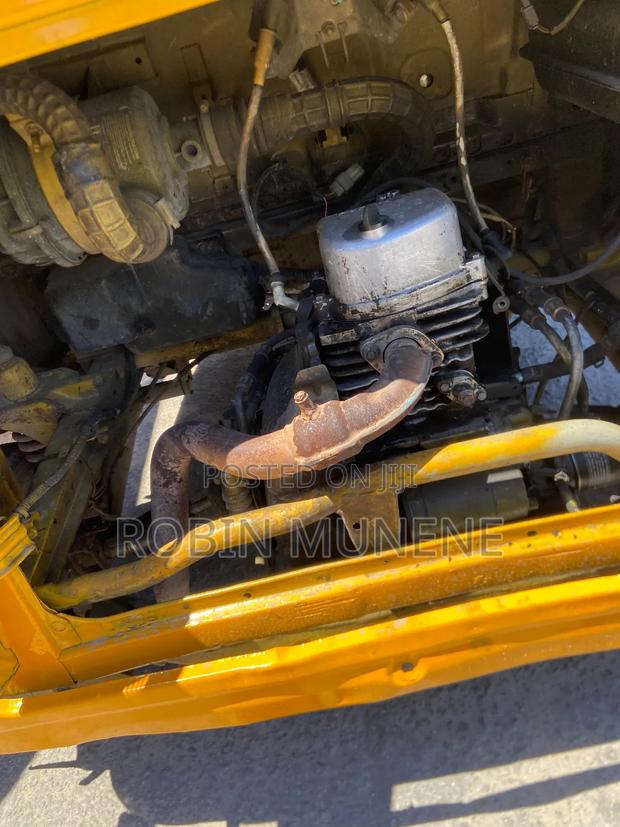 Bajaj RE 2023 Yellow - thumbnail 5