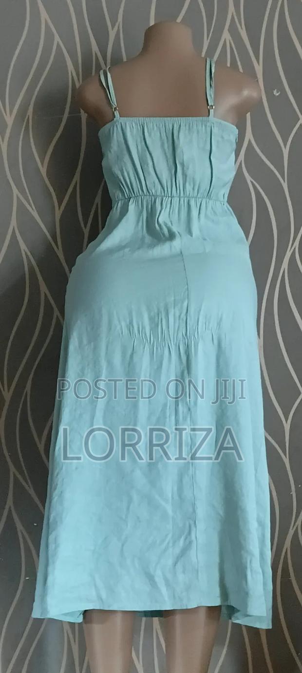 A Light Aqua Blue Spaghetti Strap Slip Dress With a Side Slit - thumbnail 3