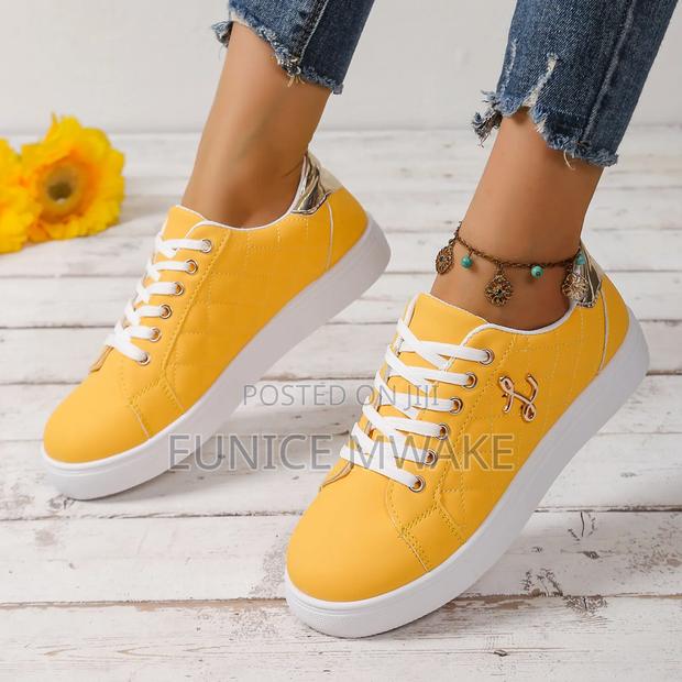 Quilted Sneakers With Gold Flair - main view