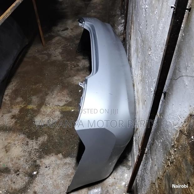 Nissan Latio/ Sunny 2012 Back Bumper, Clean Ex Japan Motor Parts