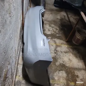 Nissan Latio/ Sunny 2012 Back Bumper, Clean Ex Japan Motor Parts