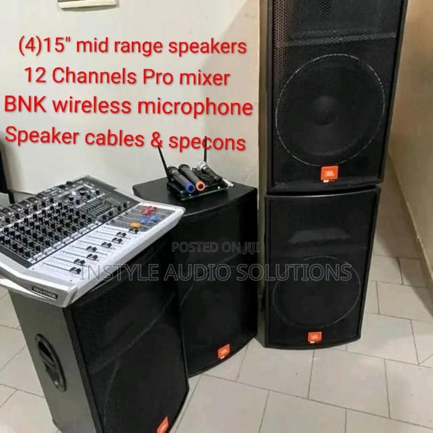 12 Channels Pro Powered Mixer- (4) Mid Range Speakers- Wireless Mic