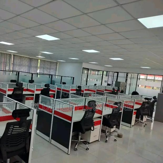 A 4 Way Office Workstation Desk
