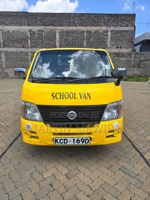 Nissan Caravan (Urvan) 2009 Yellow - thumbnail 6
