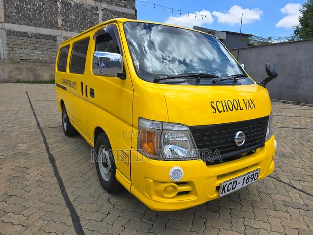 Nissan Caravan (Urvan) 2009 Yellow - thumbnail 3