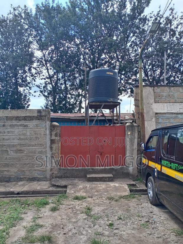 Uhuru Estate Plot With 2br Bungalow Quick Sale - main view