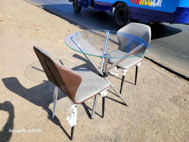 A Glass Top Dinning Table - main view