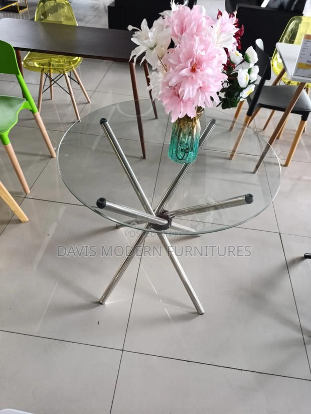 Round Glass Top -Table With a Flower - main view