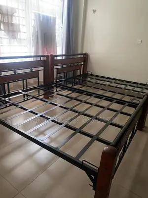 A Quick Sell 5/6 Bed Wood Steel Used in Perfect Conditions (Each )