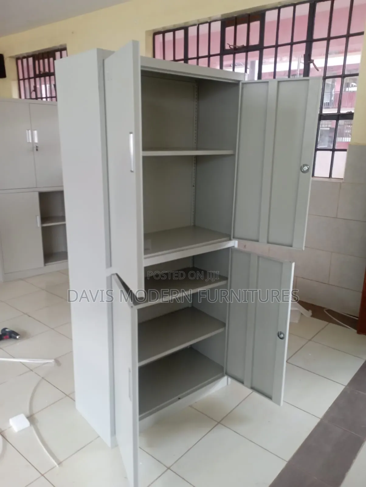 Metal Storage Cabinet With Two Hinging Door