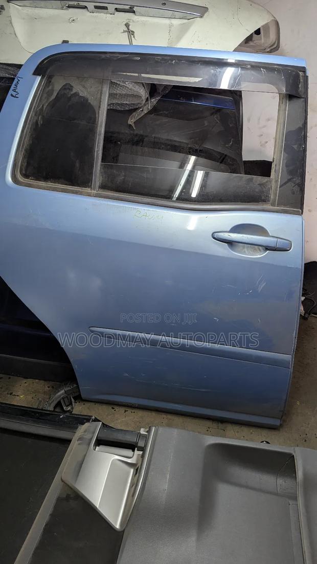Toyota Raum Sliding Door