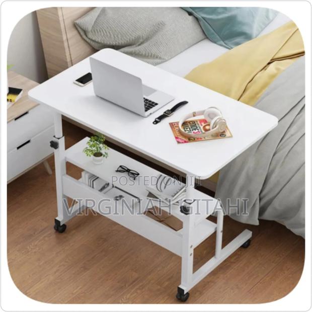 *Adjustable And Movable Laptop Table*