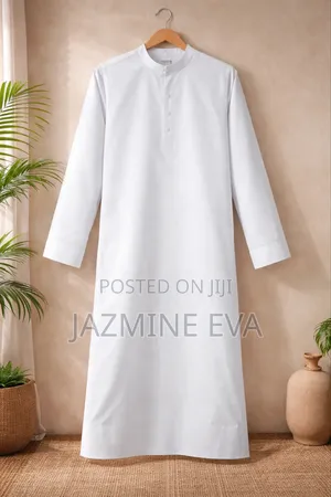 Selling a Clean, White Kanzu Worn Only Once for a Few Hours .