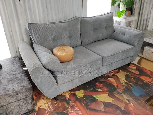Grey Tufted 3 Seater Sofa. - main view