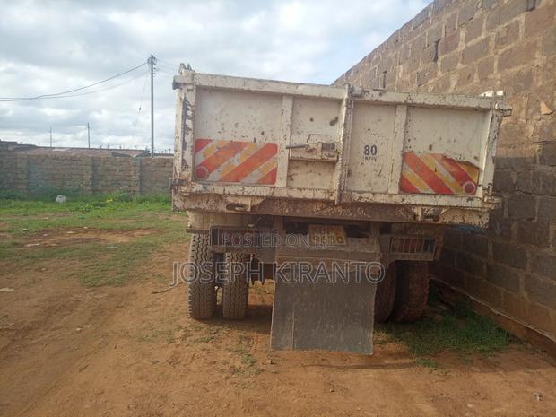 A Well Used Mitsubishi Dump Truck - thumbnail 2