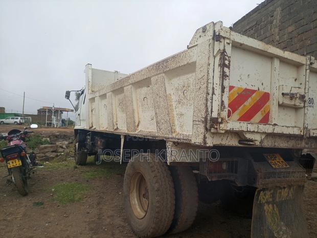 A Well Used Mitsubishi Dump Truck - thumbnail 5