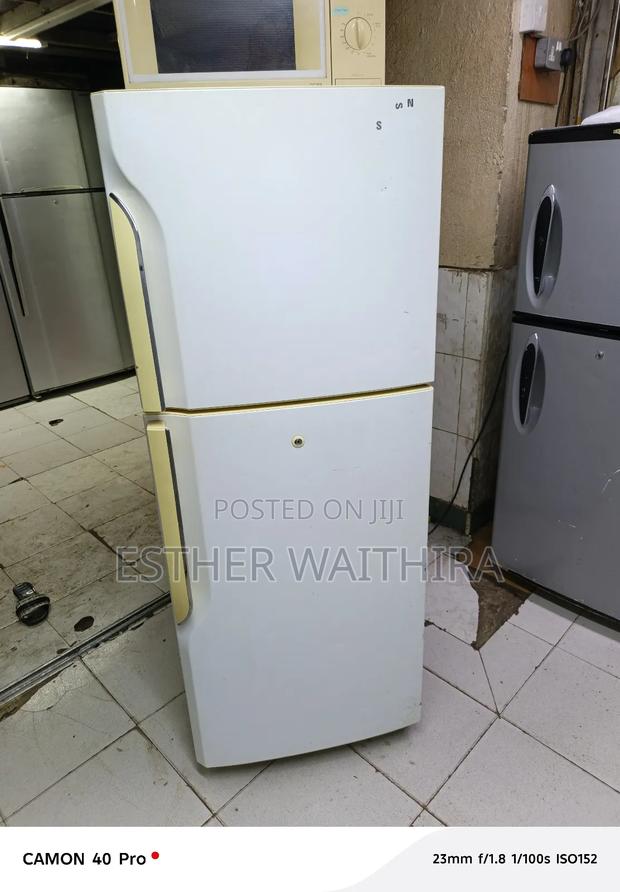White Samsung Fridge With Yellow Handle 300 Litres