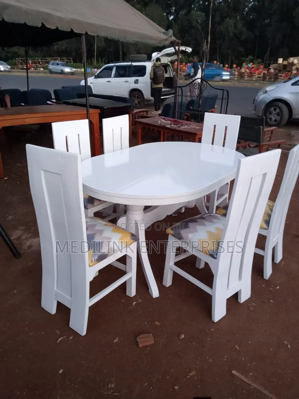 Whitish Solid 6_seater Oval Dinning Table Set