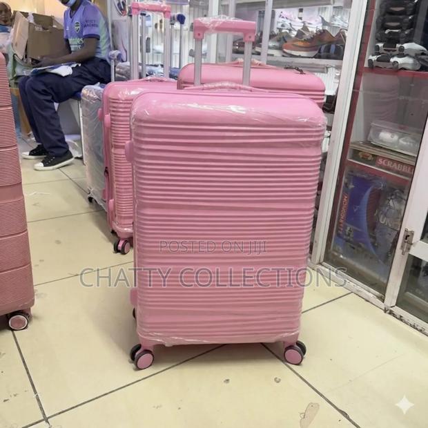 Pink 56 Cm Small Size Rubber Unbreakable Suitcase - main view