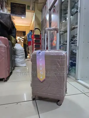 Peach 56 Cm Small Size Rubber Unbreakable Suitcase