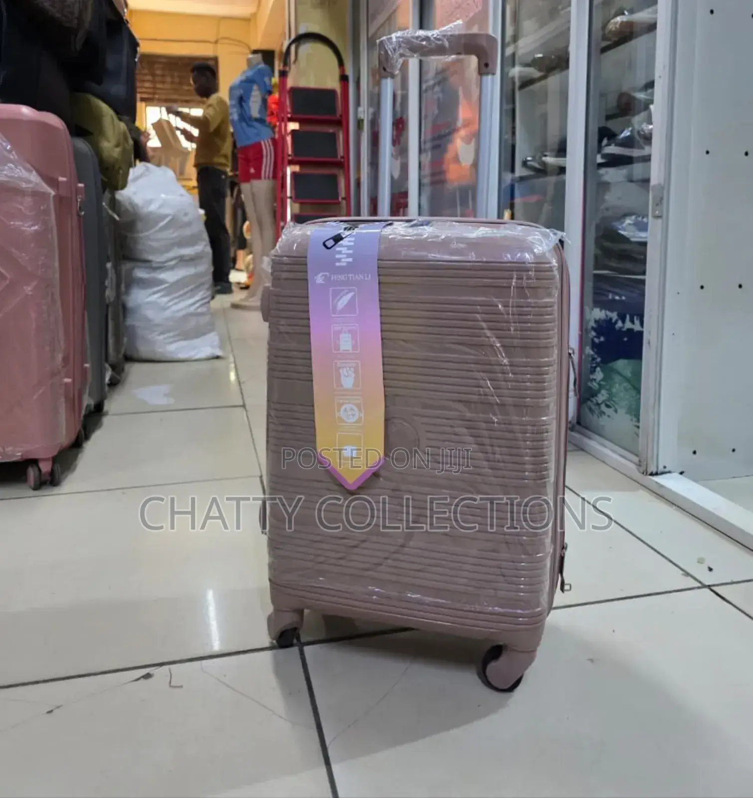Peach 56 Cm Small Size Rubber Unbreakable Suitcase