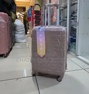 Peach 56 Cm Small Size Rubber Unbreakable Suitcase