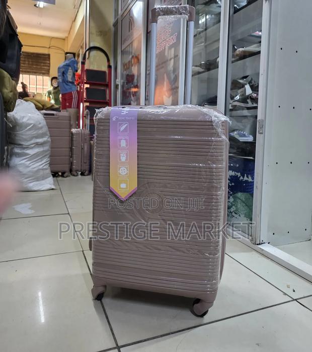 Peach 60 Cm Medium Size Rubber Unbreakable Suitcase - main view