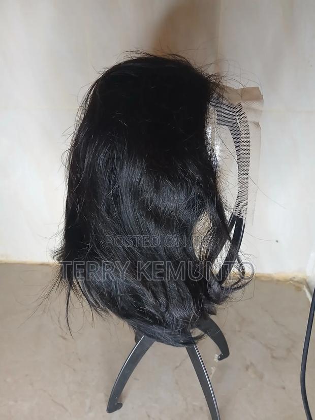 Human Hair Pixie Wig Which Is Black in Colour. - main view