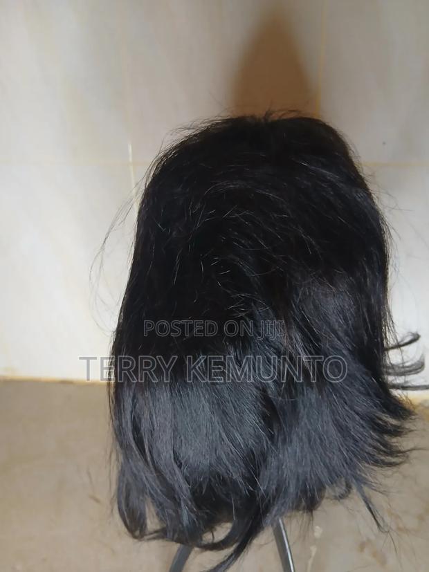 Human Hair Pixie Wig Which Is Black in Colour. - thumbnail 3