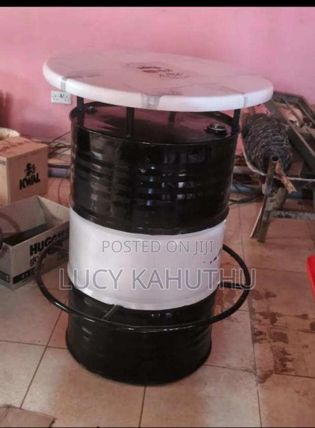 Black and White Drum With Supported Leg Stand - main view