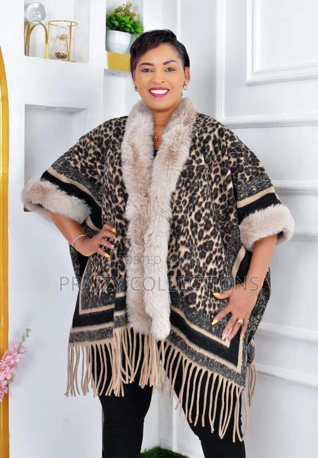 Elegant Ponchos With Fur and Beautiful Prints